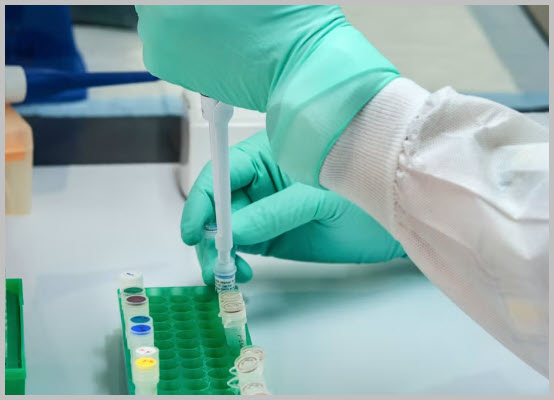 Lab professional preparing samples