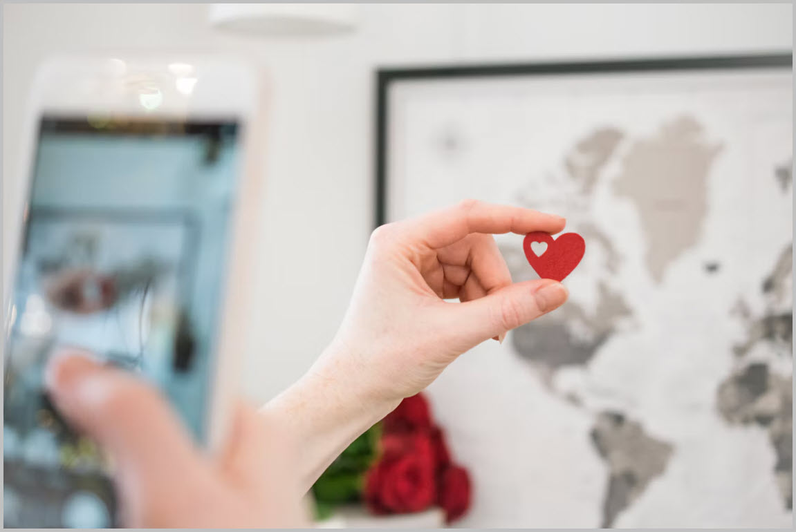 A small heart held up in a care setting